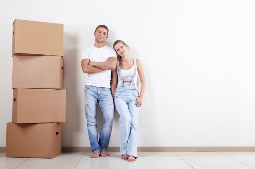 Local movers loading household items for an Enfield home move