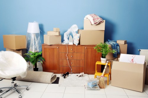 Packed moving boxes ready for a house relocation in Enfield