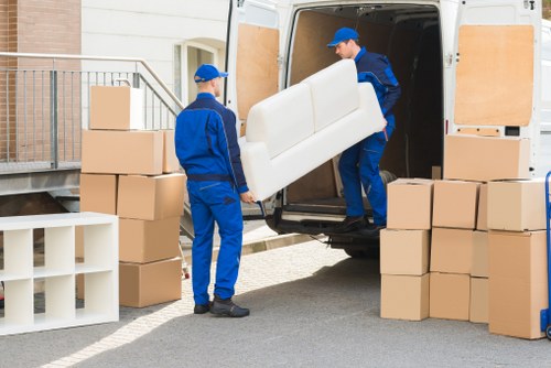 Loading furniture and boxes into a hire truck for an Enfield relocation