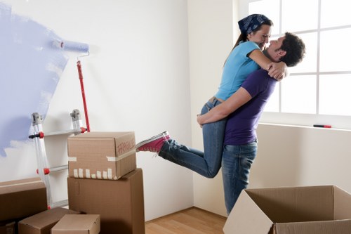Loading household items into a van in Enfield