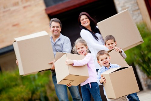Local office relocation process with labelled boxes and desks