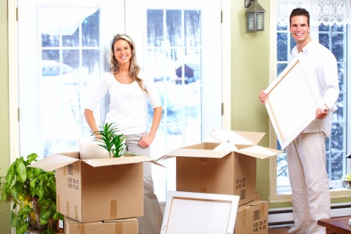 Careful loading of household furniture into a moving van