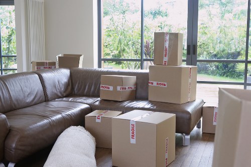 Local removal team handling furniture during an Enfield house move